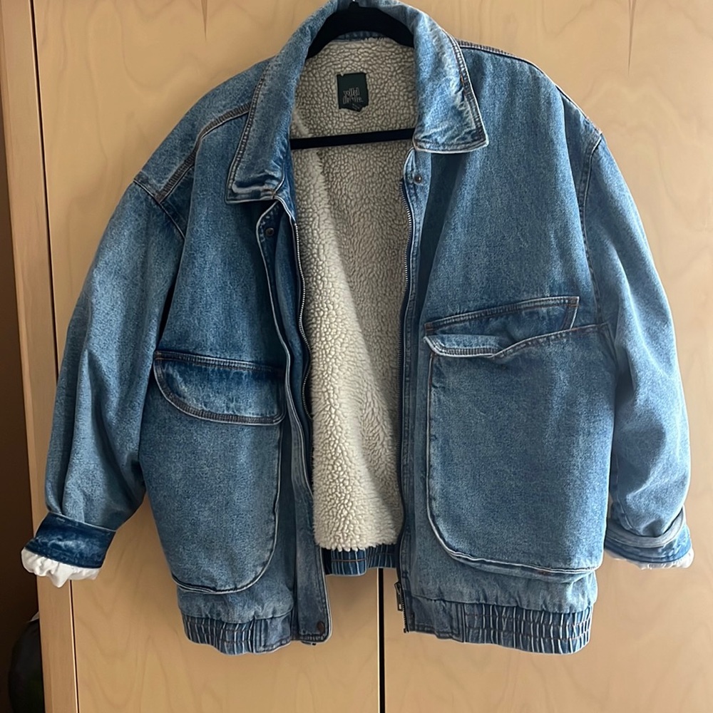 Target, denim jacket with fur lining inside.